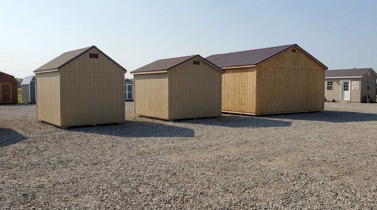 Small, medium and large wood storage sheds side by side showing different footprint sizes
