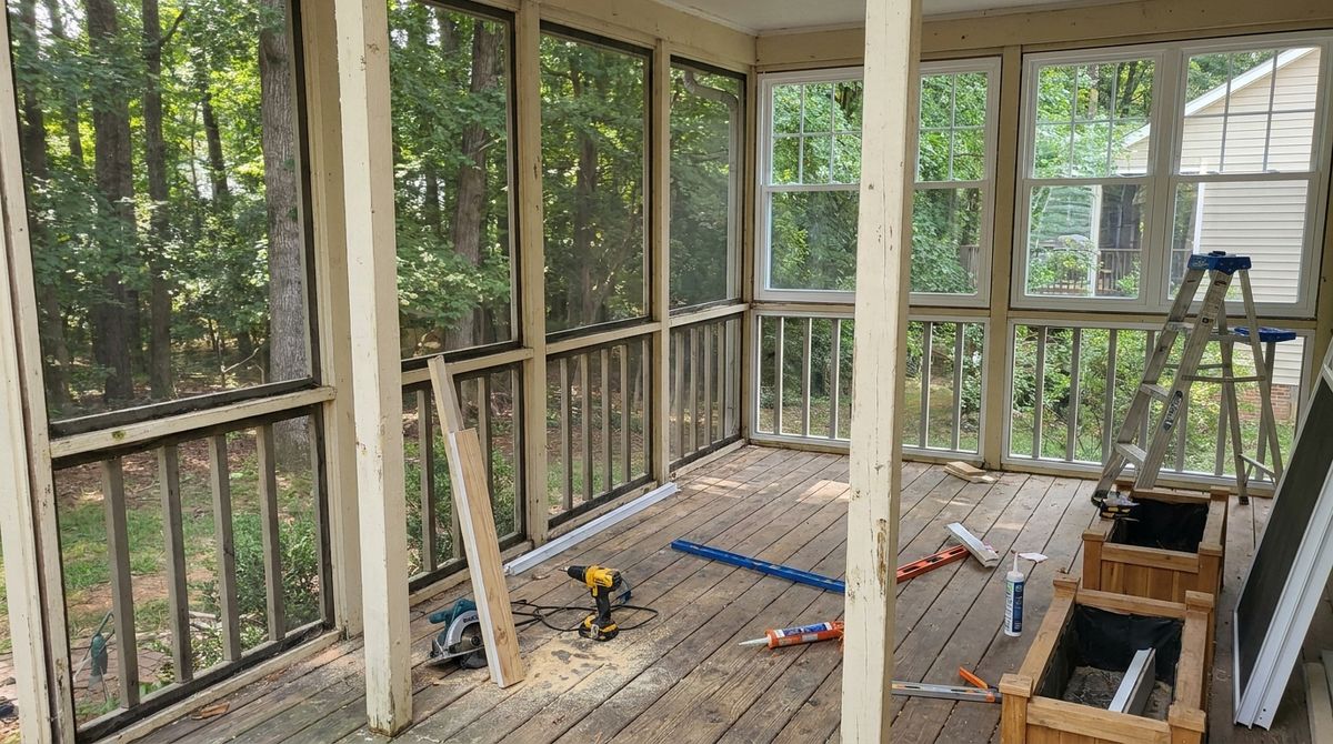 Screened porch being converted with new window units installed between wood posts