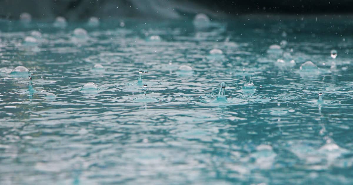 Heavy rain on a Vietnamese street during Hoi An monsoon flood season