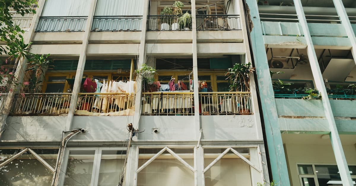 Apartment balconies in Ho Chi Minh City with clothes hanging to dry on residential clotheslines