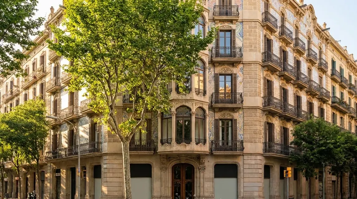 Modernista apartment facades on a chamfered corner in Barcelona's Eixample district