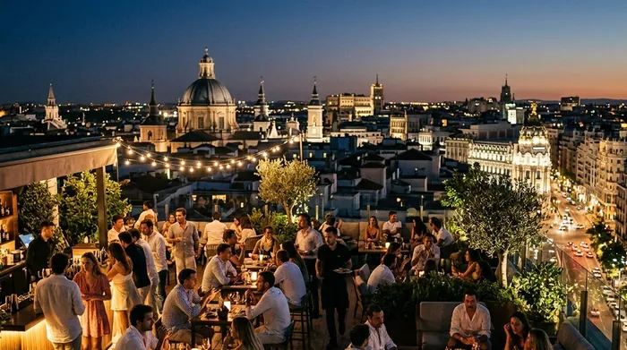 Illustration of a rooftop terrace above Madrid at night