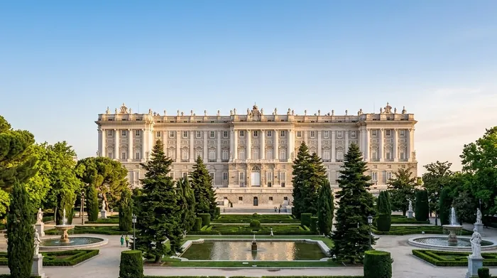 Illustration of a royal palace and formal garden in Madrid