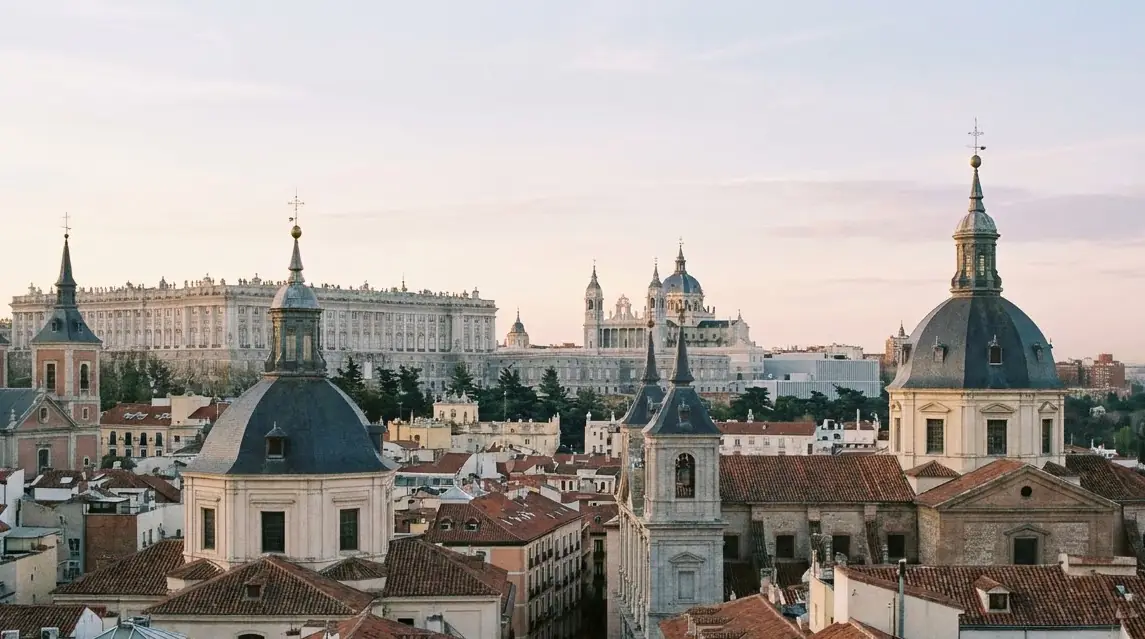 Illustration of the rooftops and domes of central Madrid in morning light