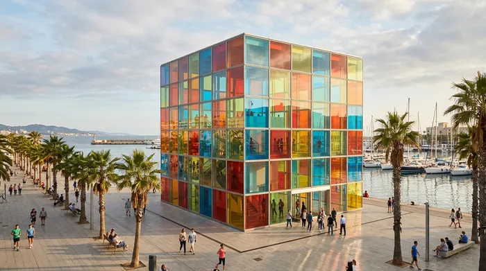 Illustration of a colourful glass cube museum on a harbour promenade