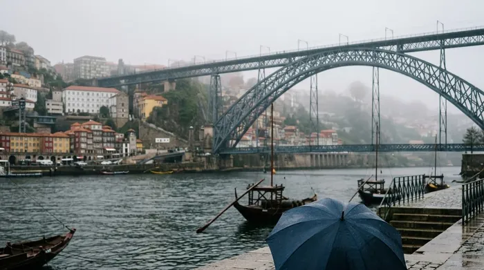 Illustration of an umbrella on Porto's riverside in the rain