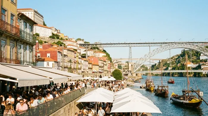 Illustration of Porto's sunny riverside terraces in summer