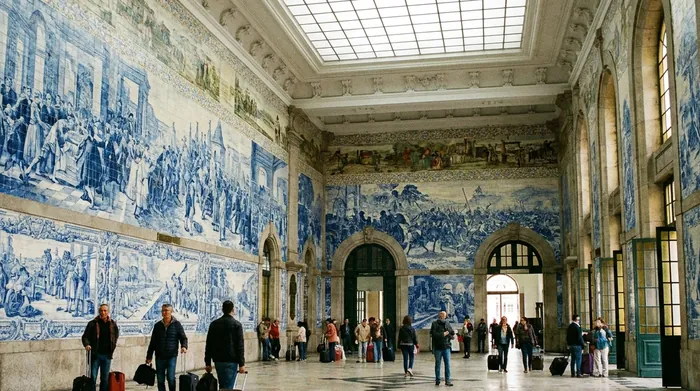 Illustration of a station hall with blue and white tile murals in Porto