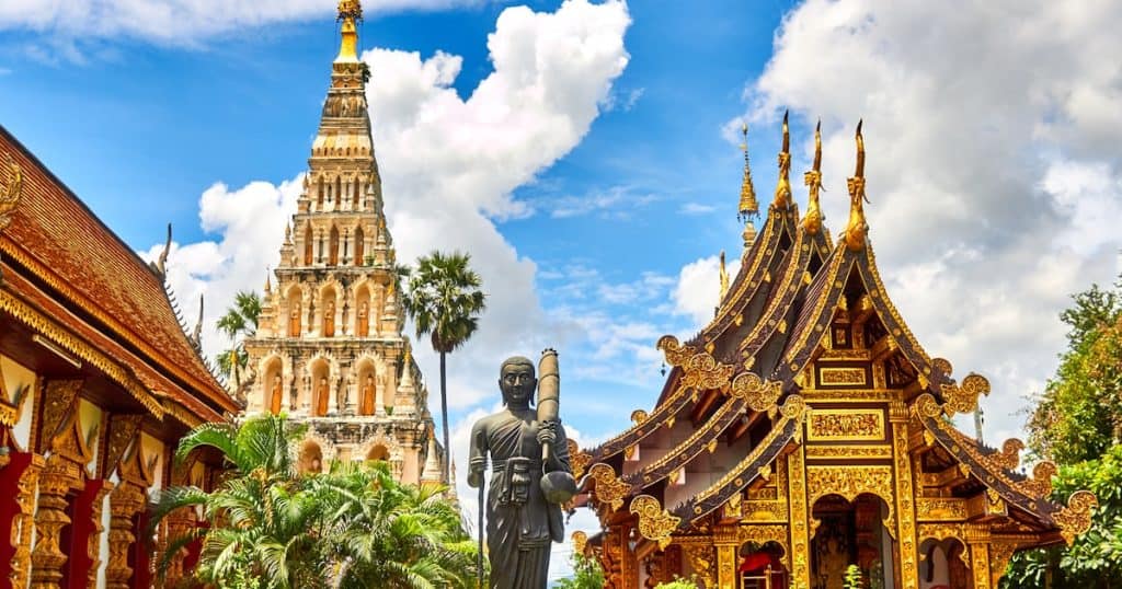 Traditional Thai temple with ornate architecture and golden details.