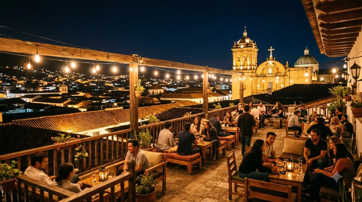 Rooftop terrace bar at night above the colonial rooftops of Cartagena, Colombia