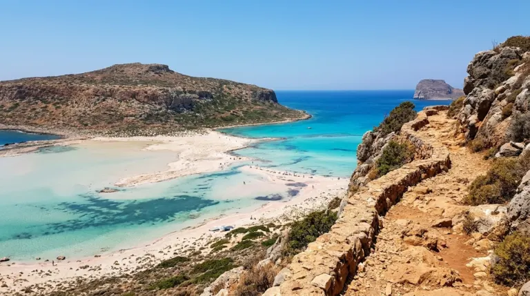 The turquoise Balos lagoon with pink tinted sand seen from the cliff path in Crete