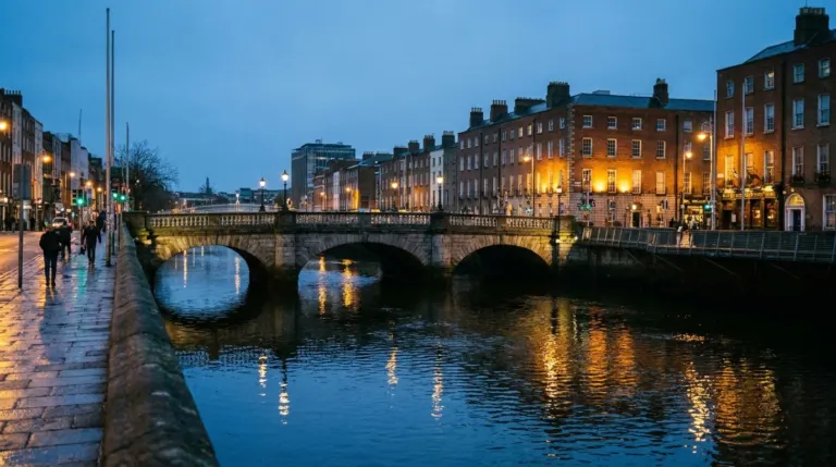 A river running through a city at dusk with bridges and lit quayside buildings, River Liffey, Dublin