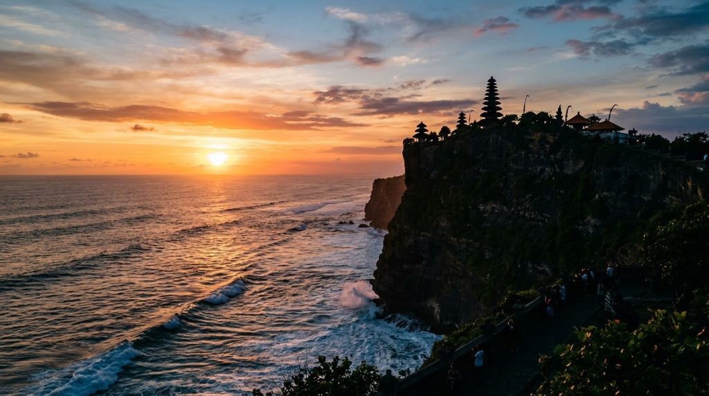 Uluwatu Temple on a cliff above the ocean at sunset in Bali