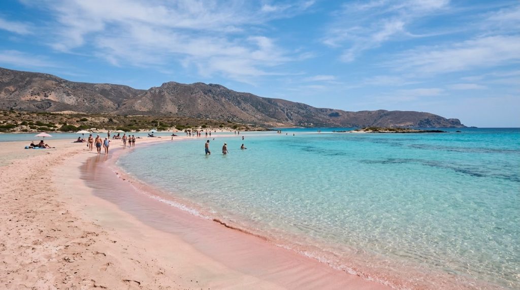 Pink sand and turquoise water at Elafonisi Beach on Crete