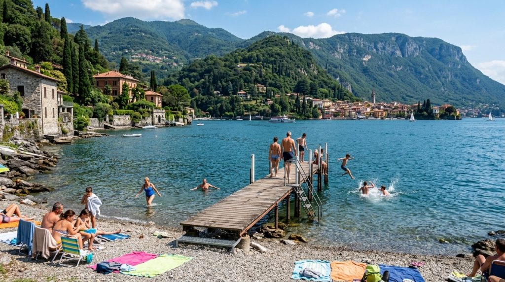 People swimming near a small pier on the shore of Lake Como