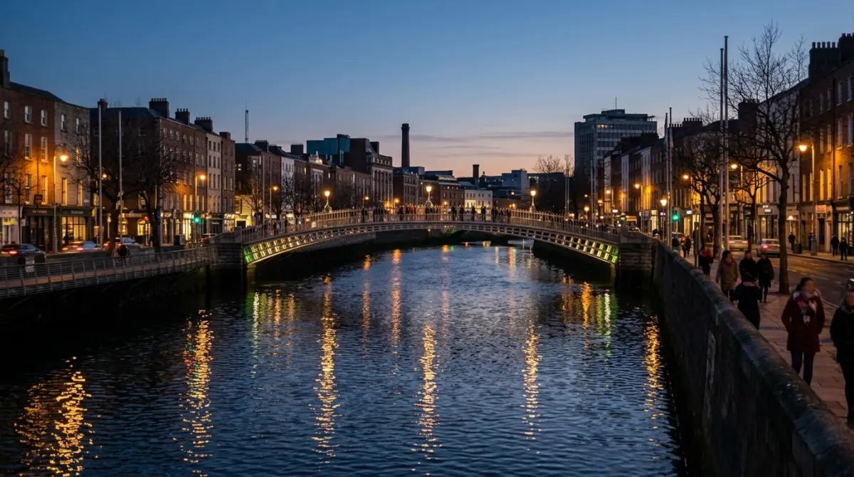 The river Liffey at winter dusk with lit Georgian quays and a footbridge reflected in the water, Dublin, Ireland