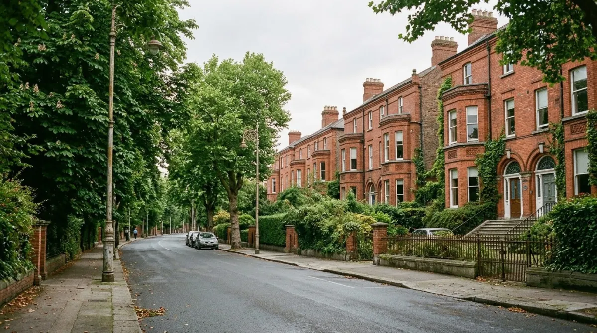 A wide leafy road lined with large red-brick houses and front gardens on a calm morning, Ballsbridge, Dublin, Ireland