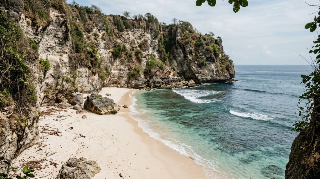 Secluded white-sand beach with cliffs on Bali's Bukit Peninsula