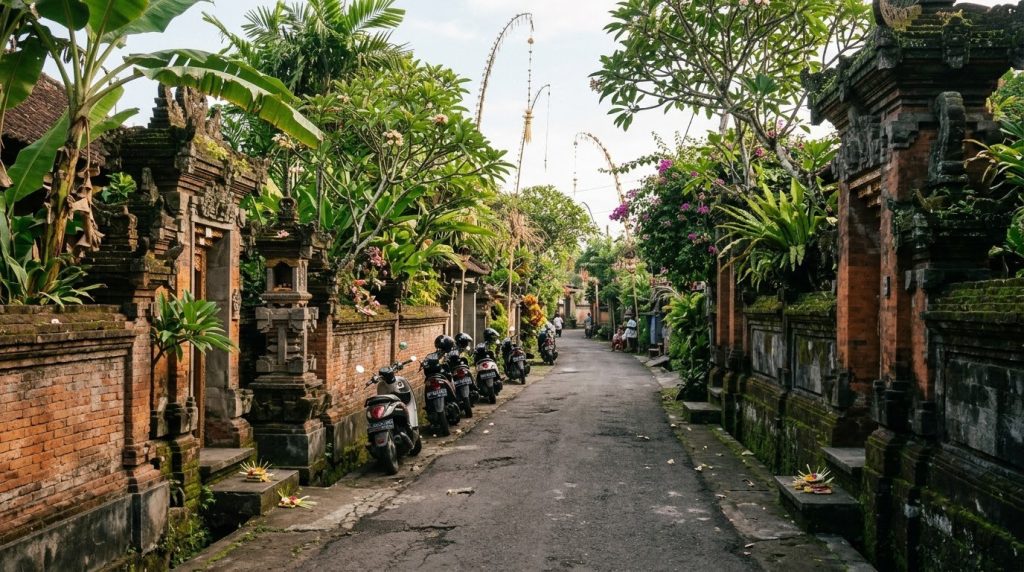Quiet residential street with parked mopeds in Ubud, Bali