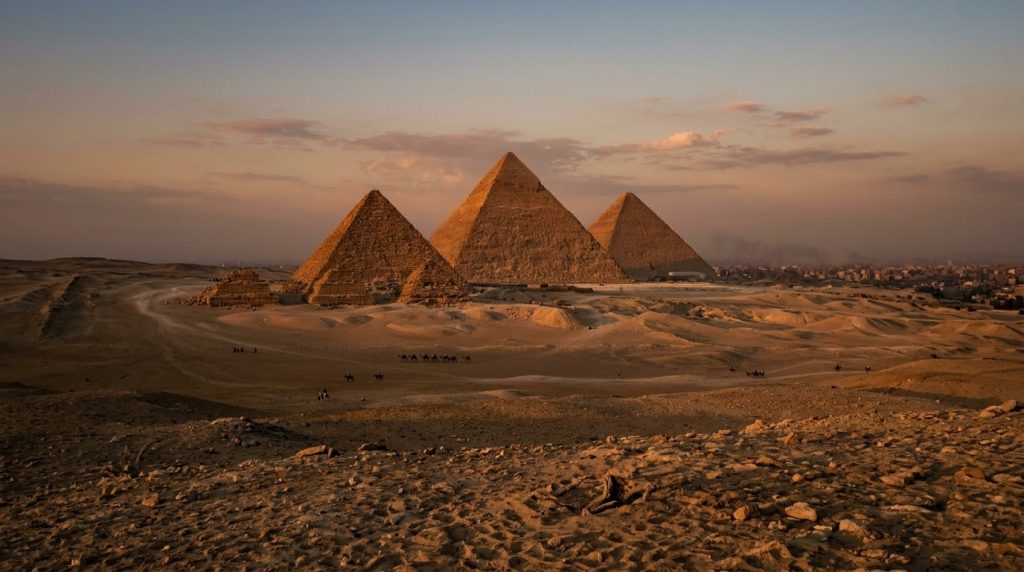 Pyramids of Giza rising above the desert plateau near Cairo