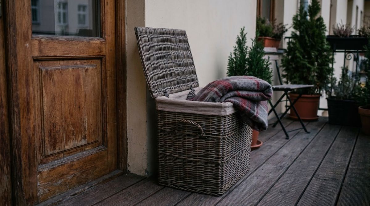 A Throw in a Lidded Basket idea for apartment balcony christmas decorating ideas